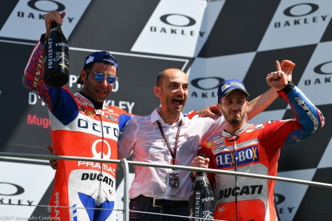 Gioia di Claudio Domenicali  tra Danilo Petrucci e Andrea Dovizioso ... rispettivamente primo e terzo al GP d'Italia 2019